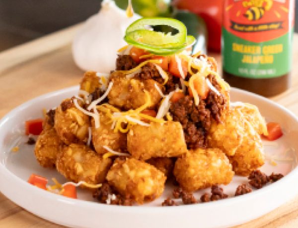 Loaded Tots with Little BEEst Sneaker Green Jalapeño Hot Honey Sauce