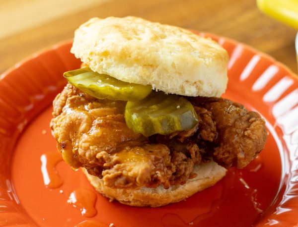 Nashville Hot Biscuit Sandwich with Little BEEst Sneaker Green Jalapeño Hot Honey Sauce