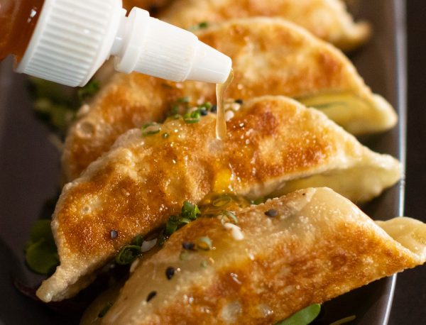 Pan-Fried Dumplings with Little BEEst Scorpion Red Hot Honey Sauce