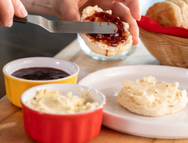 Buttermilk Biscuits with Sneaker Green Hot Honey Sauce Butter and Scorpion Raspberry Pepper Jam